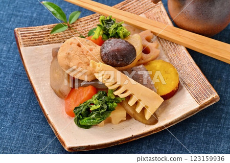 Boiled vegetables, bamboo shoots, rape blossoms, lotus root, shiitake mushrooms, carrots, burdock, radish, konnyaku, ganmodoki, and simmered dishes. Boiled vegetables, bamboo shoots, rape blossoms, lotus root, shiitake mushrooms, carrots, burdock, radish, konnyaku, ganmodoki, and simmered dishes. 123159936
