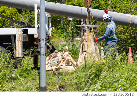 Pole replacement and removal work using a pole digging vehicle 123160518