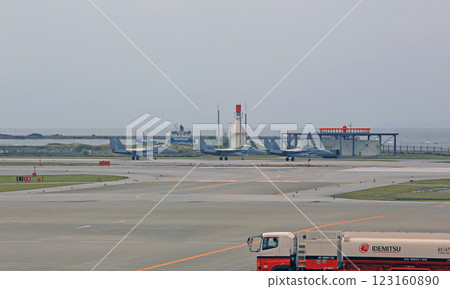 Japan Air Self Defense Force land on airport in naha. JASDF is the air warfare branch of the Japan Self-Defense Forces 123160890