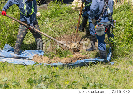 Excavation work for electric pole replacement Excavation work for electric pole replacement 123161080