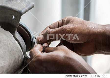 The drilling tool regrind process by manual operation. 123161388