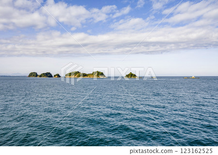 Tobishima Island as seen from a sightseeing boat around Toba Bay 123162525