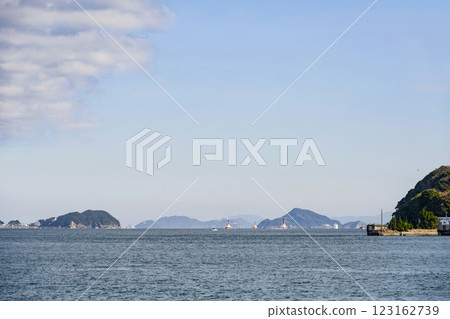 View of Toshi Town and Kamishima from a sightseeing boat on Toba Bay 123162739