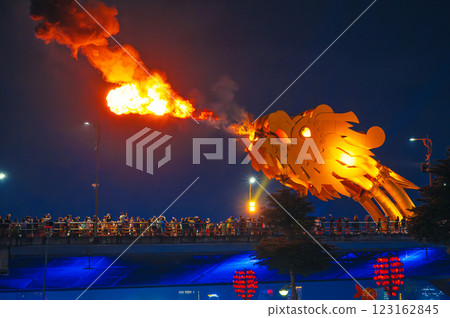 Fire water show on Cau rong Dragon Bridge in Da Nang in Vietnam at night Fire water show on Cau rong Dragon Bridge in Da Nang in Vietnam at night 123162845