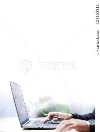 Business photo with space for text, a businessman keeping records on a laptop for a business, doing accounting on a laptop, hand typing on laptop Business photo with space for text, a businessman keeping records on a laptop for a business, doing accounting on a laptop, hand typing on laptop 123163518