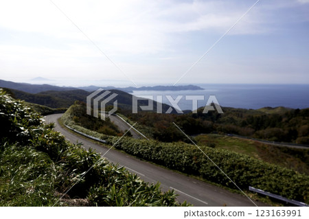 View from the observation deck, the Tatsudomari Line and the Sea of Japan, with Mt. Iwaki in the distance View from the observation deck, the Tatsudomari Line and the Sea of Japan, with Mt. Iwaki in the distance 123163991