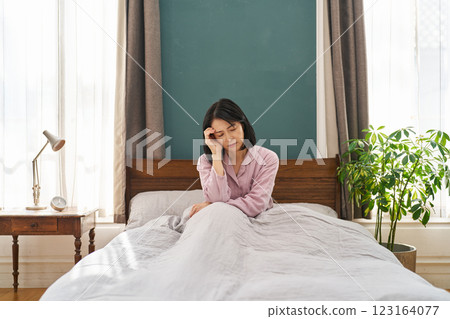 A woman having a gloomy morning 123164077