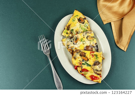 A hearty breakfast of omelet. A hearty breakfast of omelet. 123164227