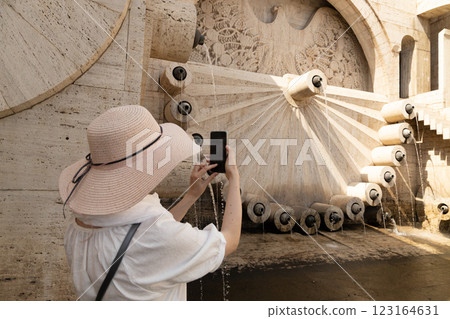 Capturing the beauty of an ancient fountain while enjoying a sunny afternoon in a historic location Capturing the beauty of an ancient fountain while enjoying a sunny afternoon in a historic location 123164631