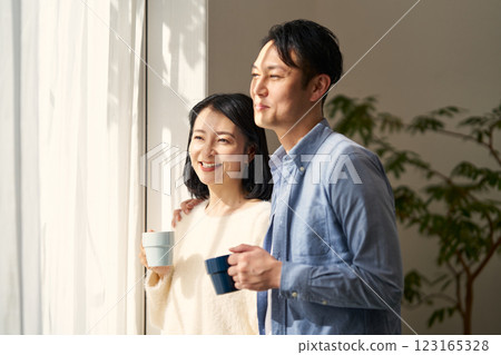 Couple looking at their garden 123165328