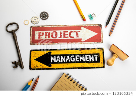 Project management concept. Red and yellow directional arrow with text Project management concept. Red and yellow directional arrow with text 123165334