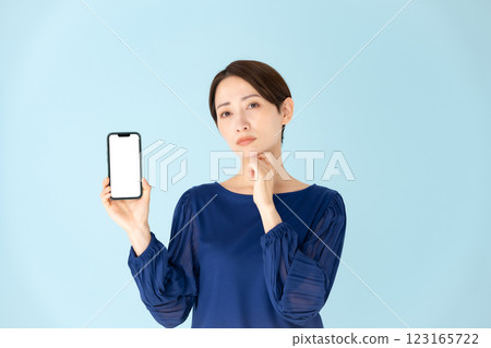 Woman, casual, portrait, smartphone, worries 123165722