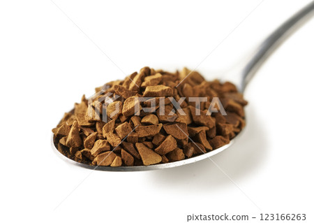 Spoon with aromatic instant coffee isolated Spoon with aromatic instant coffee isolated 123166263