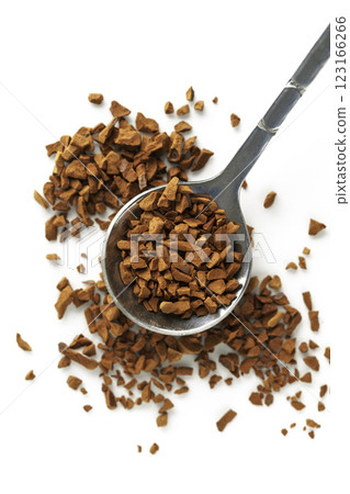 Spoon with aromatic instant coffee isolated Spoon with aromatic instant coffee isolated 123166266