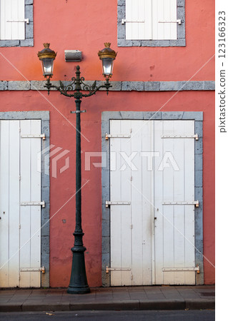 Old colonial style lamp post in Saint Denis de La Reunion Old colonial style lamp post in Saint Denis de La Reunion 123166323