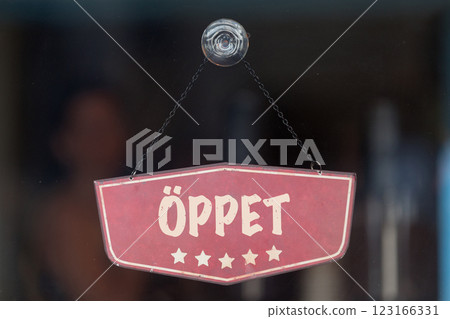 Open sign written in Swedish 123166331