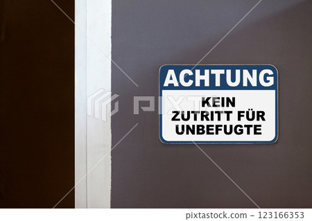 Notice, No access for unauthorized persons - Sign written in German 123166353