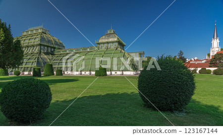 The Palmenhaus Schoenbrunn timelapse hyperlapse - a large greenhouse in the park Schoenbrunn in Vienna, Austria The Palmenhaus Schoenbrunn timelapse hyperlapse - a large greenhouse in the park Schoenbrunn in Vienna, Austria 123167144