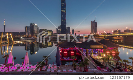 Donaustadt Danube City night to day timelapse is a modern quarter with skyscrapers and business centres in Vienna, Austria. 123167179