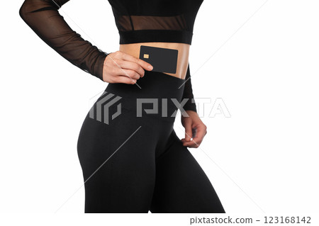 Caucasian female hand holding black premium credit bank card on white background. payment online 123168142