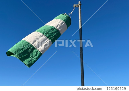 Windsock when wind speed is strong 123169329