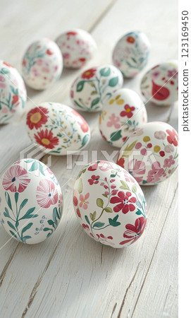 Elegantly decorated floral patterned easter eggs on rustic wooden surface. concept of easter celebration, artistic design, colorful decoration, festive creativity. Vertical 123169450
