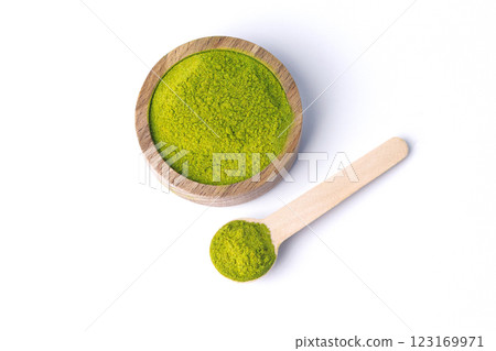 Wheat grass with wooden shovel, detox superfood, isolated on white background top view 123169971