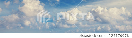 Blue sky with clouds. Cloudy sky background. Horizontal banner 123170078