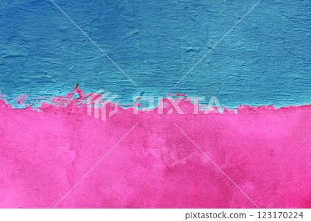 The concrete wall is half painted with blue and pink color. Abstract grunge background. Bi-color concrete wall background The concrete wall is half painted with blue and pink color. Abstract grunge background. Bi-color concrete wall background 123170224