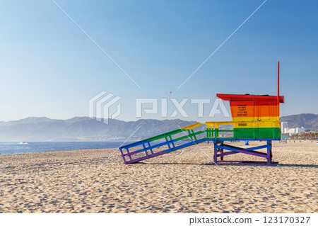 Vibrant lifeguard tower painted in LGBTQ rainbow colors 123170327