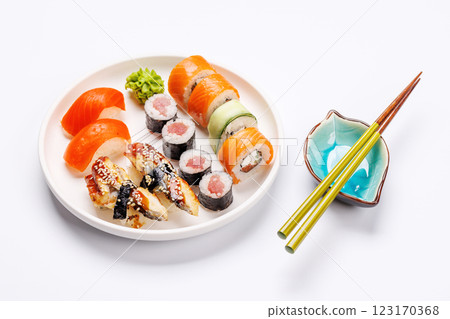 Assorted sushi and maki rolls beautifully arranged on plate Assorted sushi and maki rolls beautifully arranged on plate 123170368