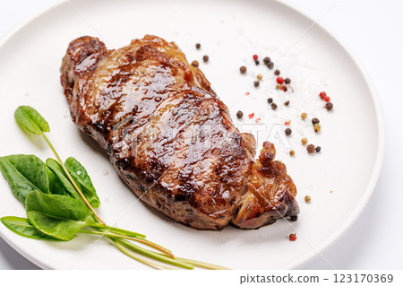 A perfectly cooked striploin steak with a juicy, tender texture A perfectly cooked striploin steak with a juicy, tender texture 123170369