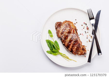 A perfectly cooked striploin steak with a juicy, tender texture A perfectly cooked striploin steak with a juicy, tender texture 123170370