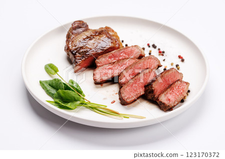 A perfectly cooked sliced striploin steak with a juicy, tender texture 123170372