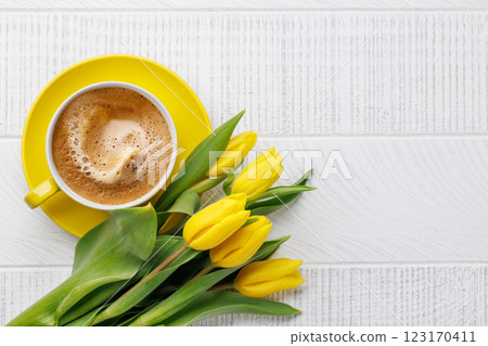 Easter template with coffee cup and yellow tulips 123170411
