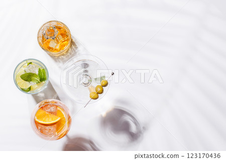 A vibrant display of cocktails, including Aperol Spritz, Mojito, and Martini 123170436
