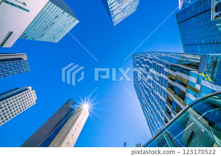 Tokyo cityscape in Japan. A new era, Shibuya buildings reflecting sunlight. Aksh, Hikarie, Stream… 123170522