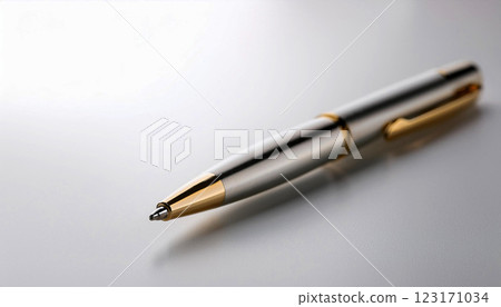 close up of a pen, A sleek black ballpoint pen with silver accents resting on a reflective white surface, pen is elegance, making it suitable for business, office, writing, and productivity themes 123171034