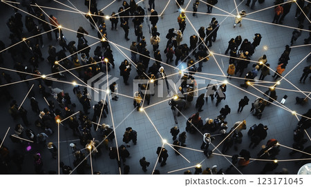 An expansive aerial view shows bustling pedestrians navigating a vibrant urban space filled with endless lights 123171045