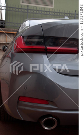 Detail of luxury car headlights lamp, grey modern car tail red lamp 123171848