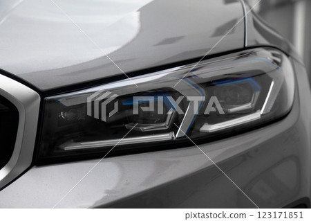 Detail of luxury grey car headlights lamp, modern car front lamp 123171851