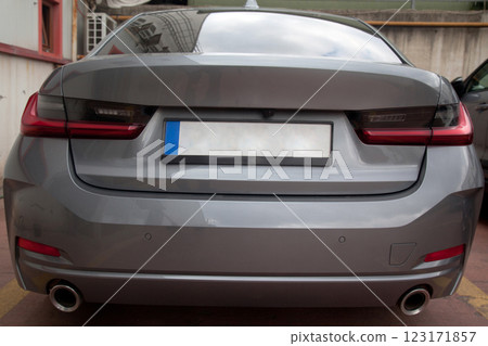 Detail of luxury car headlights lamp, grey modern car tail red lamp Detail of luxury car headlights lamp, grey modern car tail red lamp 123171857