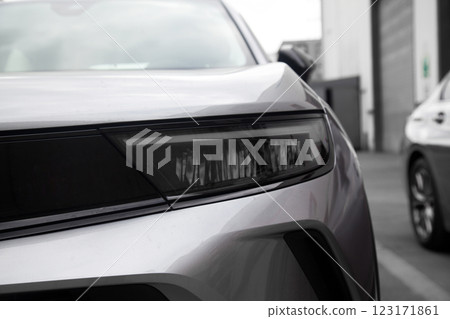 Detail of luxury grey car headlights lamp, modern car front lamp 123171861