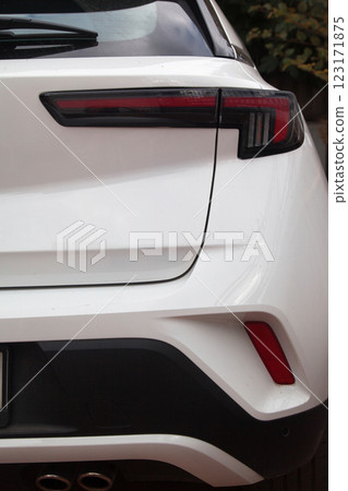 Detail of luxury car headlights lamp, white modern car tail red lamp 123171875