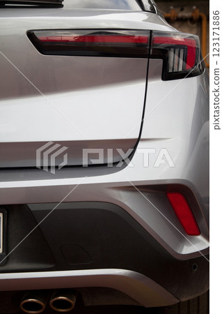 Detail of luxury car headlights lamp, grey modern car tail red lamp 123171886
