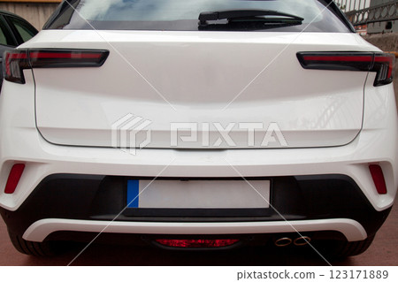 Detail of luxury car headlights lamp, white modern car tail red lamp 123171889