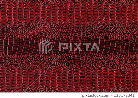 Imitation crocodile skin red and burgundy texture, useful as background for any design work Imitation crocodile skin red and burgundy texture, useful as background for any design work 123172341