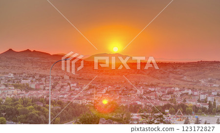 Sunset view from old castle in historical city town of Nevsehir aerial timelapse Sunset view from old castle in historical city town of Nevsehir aerial timelapse 123172827
