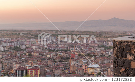 Aerial view from old castle in historical city town of Nevsehir day to night timelapse Aerial view from old castle in historical city town of Nevsehir day to night timelapse 123172828