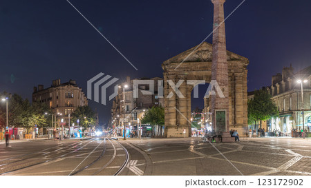 Porte d'Aquitaine arch and obelisk at Place de la Victoire night timelapse in Bordeaux, France. Porte d'Aquitaine arch and obelisk at Place de la Victoire night timelapse in Bordeaux, France. 123172902